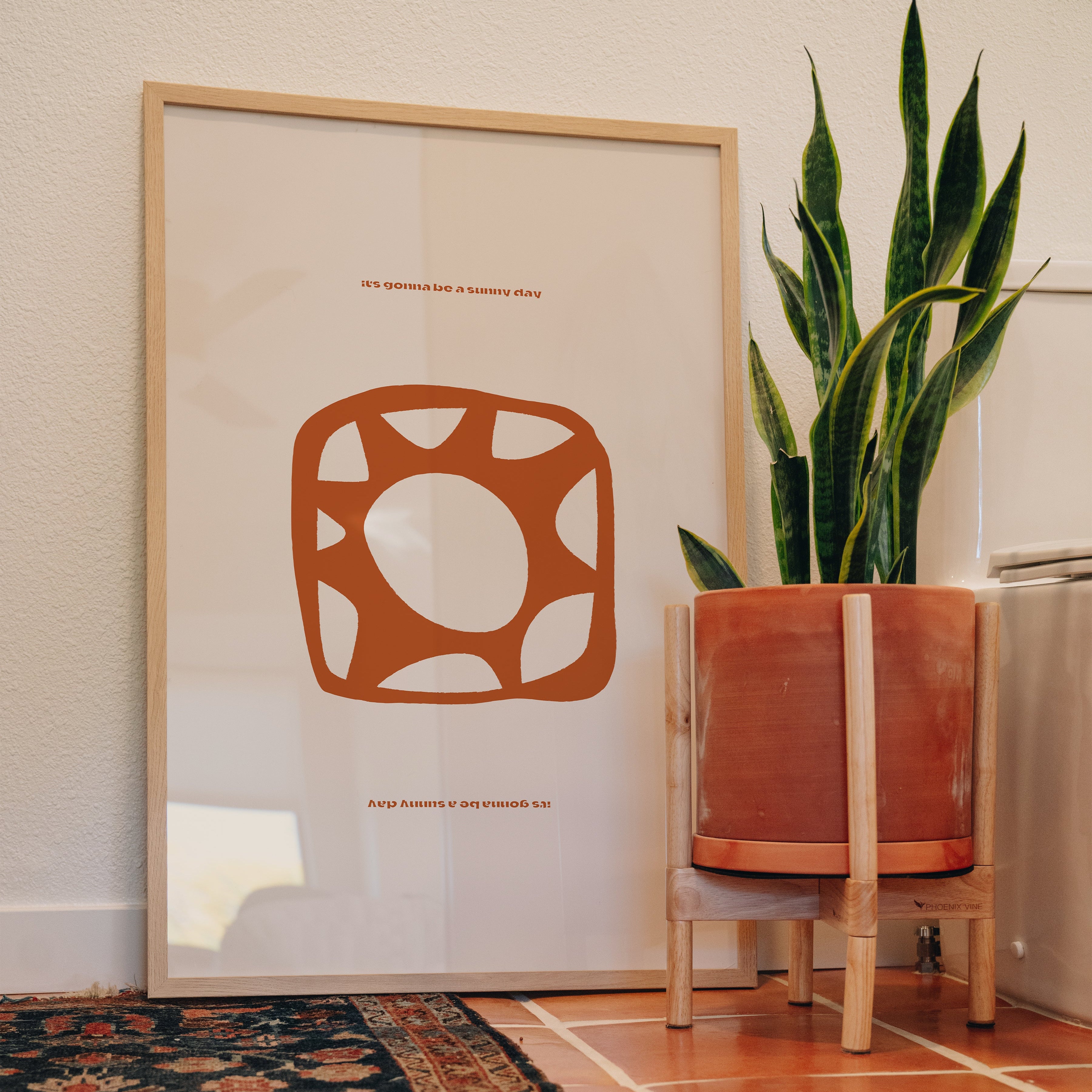 It's Gonna Be A Sunny Day typography print displayed in bathroom with terracotta tile floor, positive wall art styling inspiration